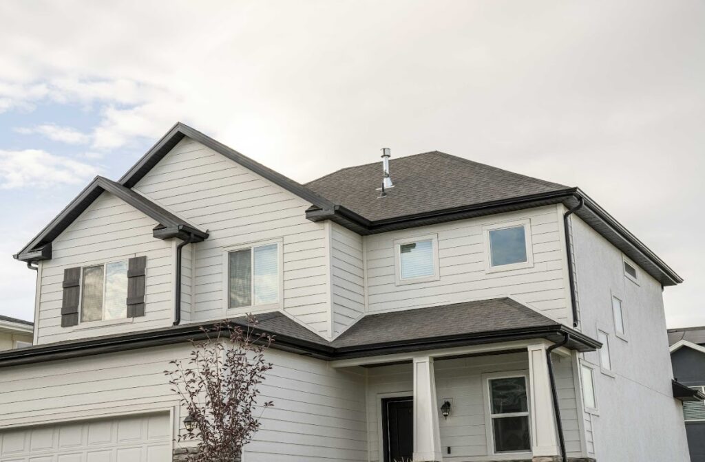 beautiful Arkansas home with newly installed architectural shingle roof curb appeal