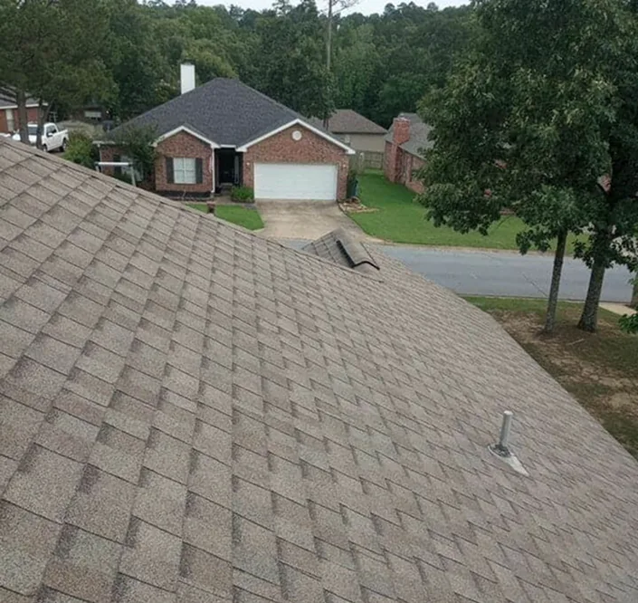 Close-up of a weathered asphalt shingle roof