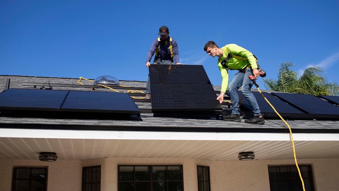 Unprofessional roofing crew on a residential roof Unprofessional roofing crew on a residential roof