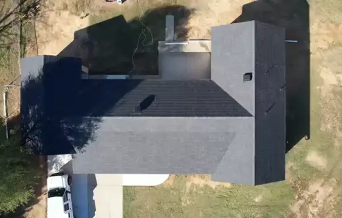 Aerial view of a home with a newly replaced roof