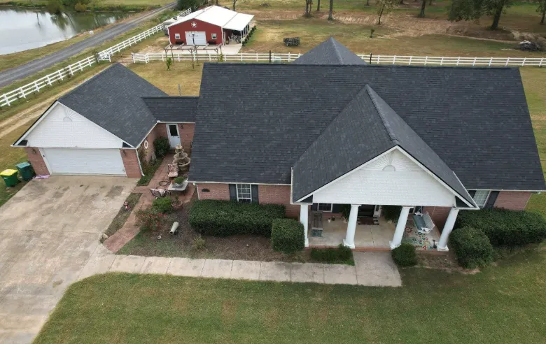 Roofers working on a home during a roof replacement